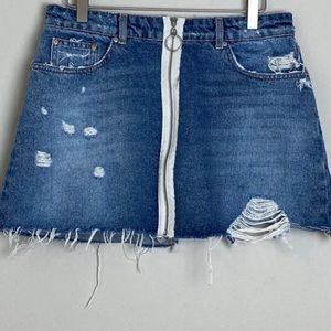 Zara distressed denim skirt with frayed raw hem.